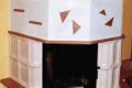 <p>Warmluft-Kamin mit Kachelverkleidung RUKA und Kamineinsatz Schmid</p>